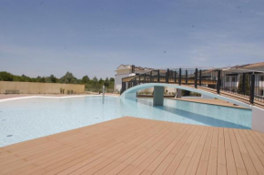 Homely flat with private garden and common pool